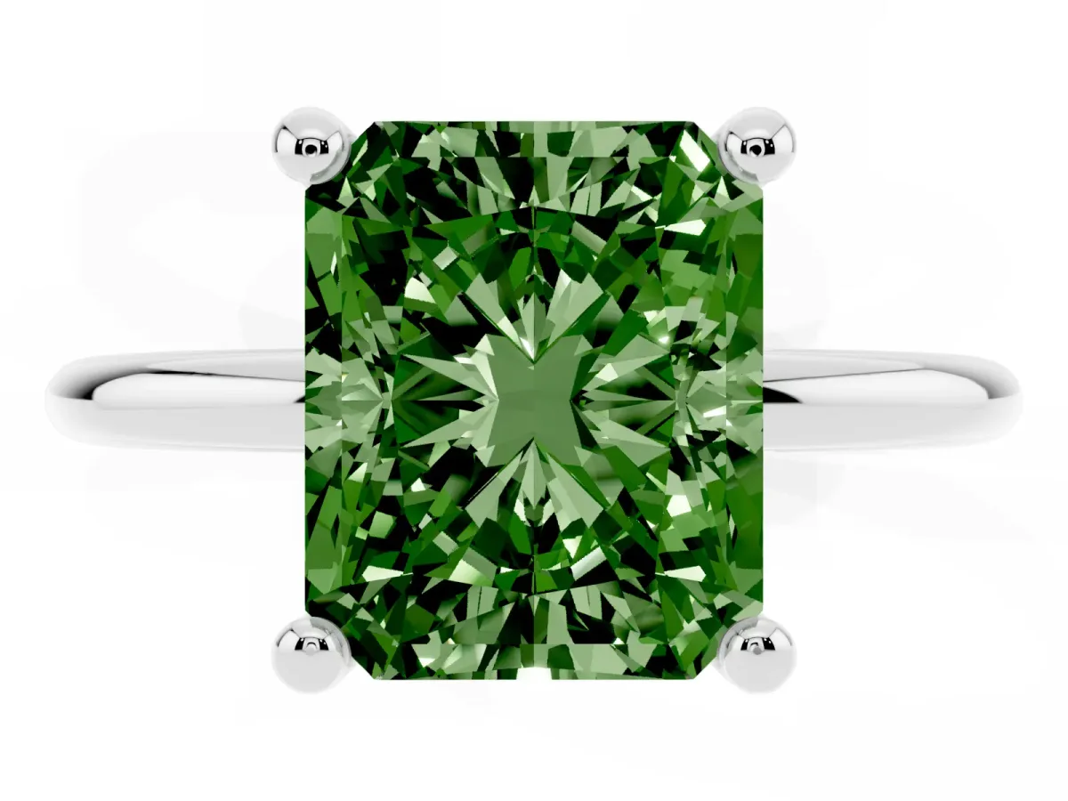 Fancy Green Radiant Cut Solitaire Diamond Ring with 4-Prong Setting on a Classic Band Silver