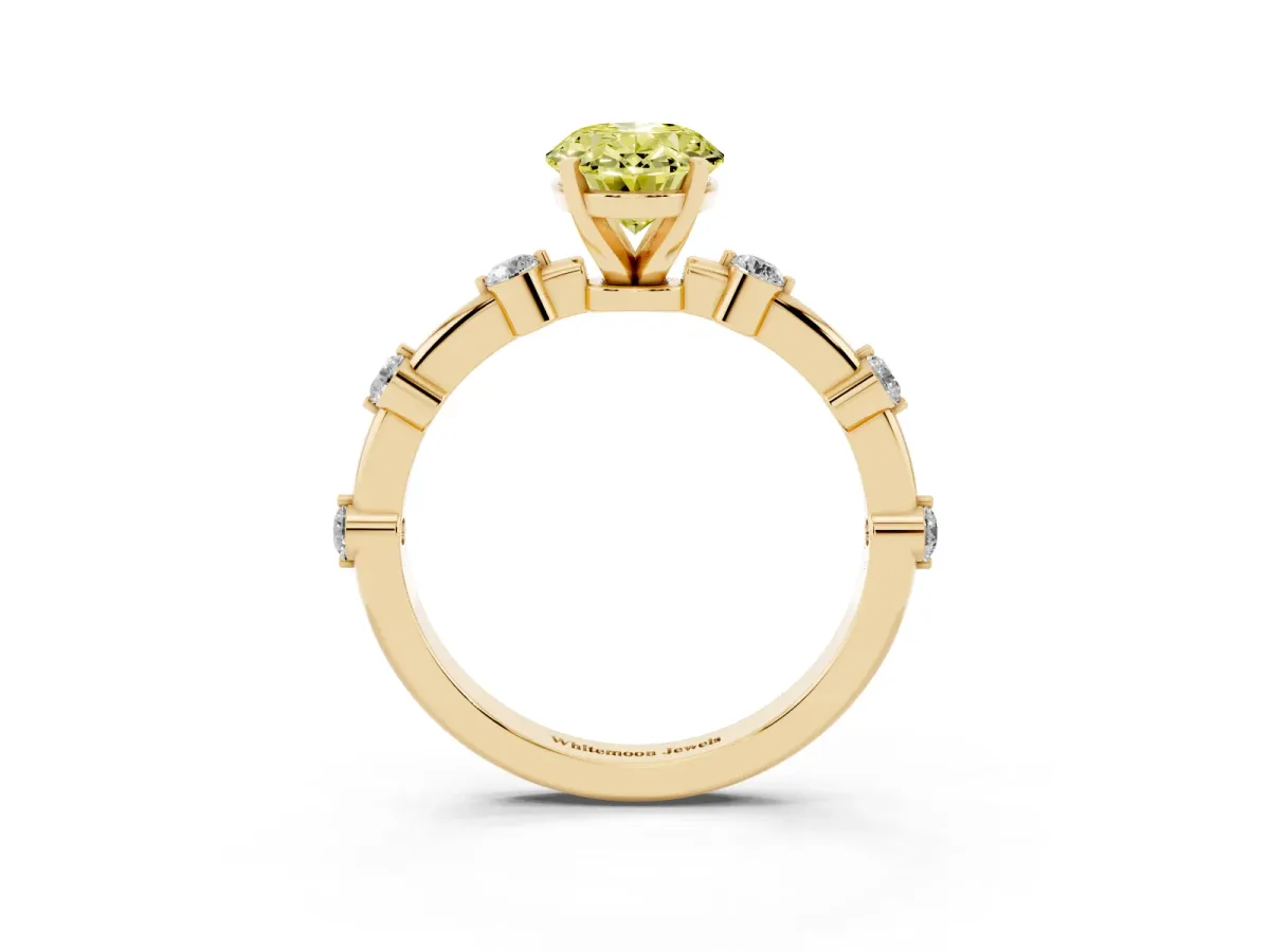 Fancy Yellow Oval Cut Solitaire Diamond Ring with Bezel Set Side Stones and Prong Setting Yellow gold