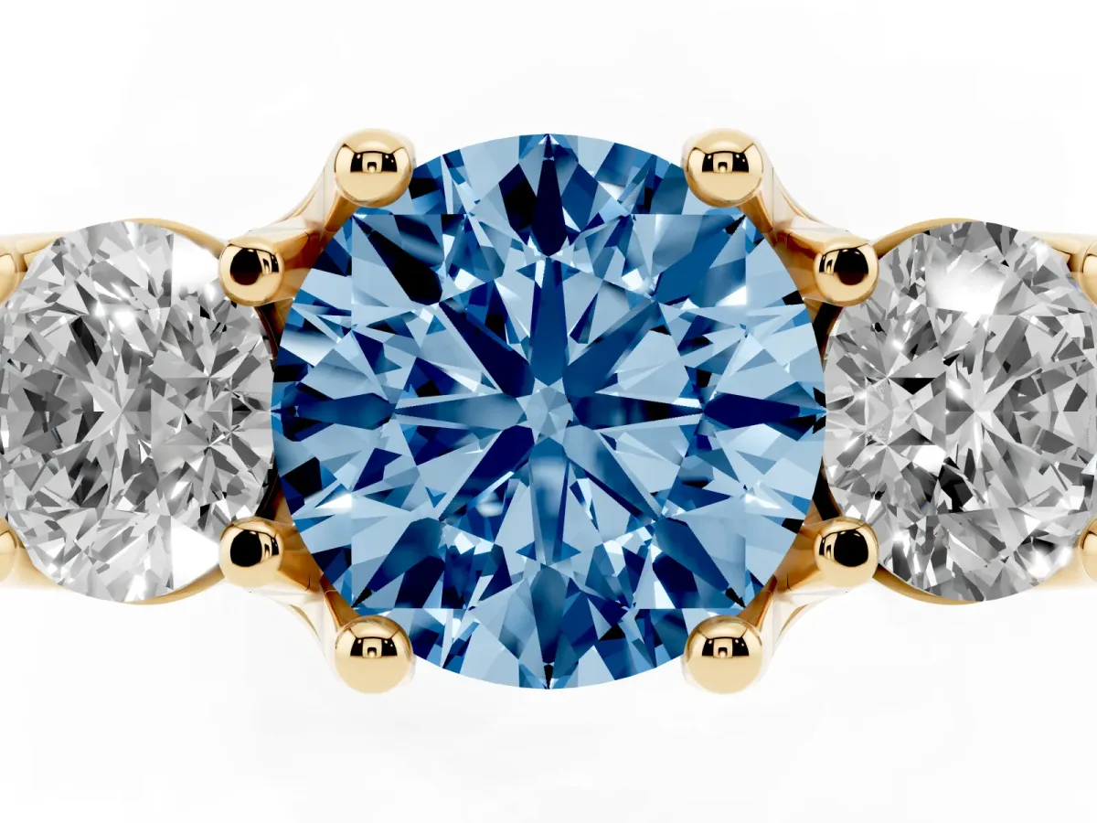 Fancy Blue Round Cut Diamond Three-Stone Ring with Channel Set Band and Four-Prong Setting Yellow gold