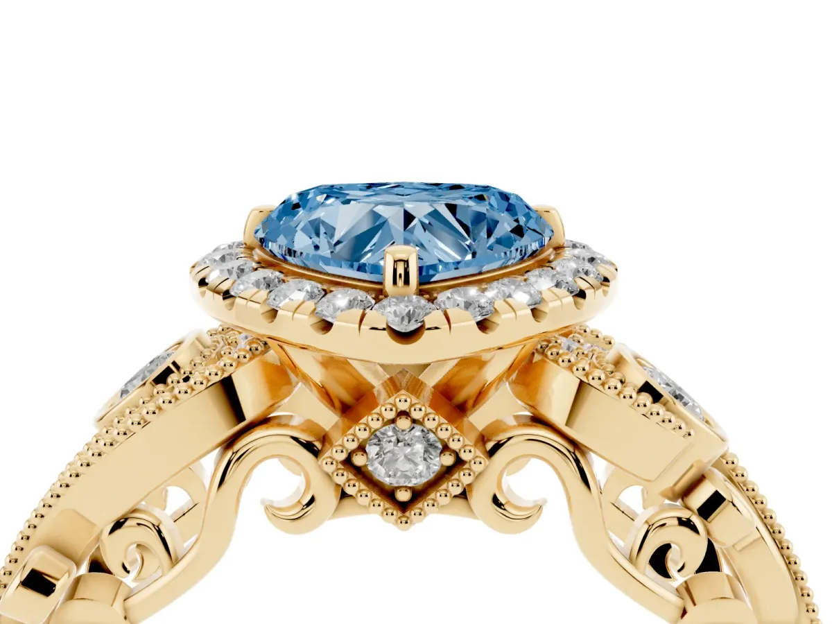Fancy Blue Heart Cut Halo Diamond Ring with Milgrain and Bezel Accents on a Split Shank Band Yellow gold