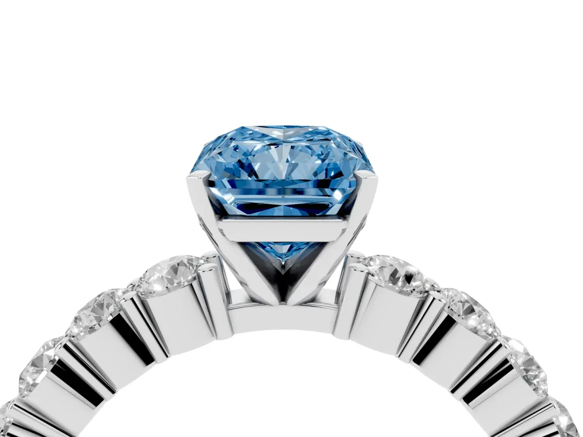 Fancy Blue Radiant Cut Diamond Solitaire Ring with Shared Prong Round Side Stones Platinum