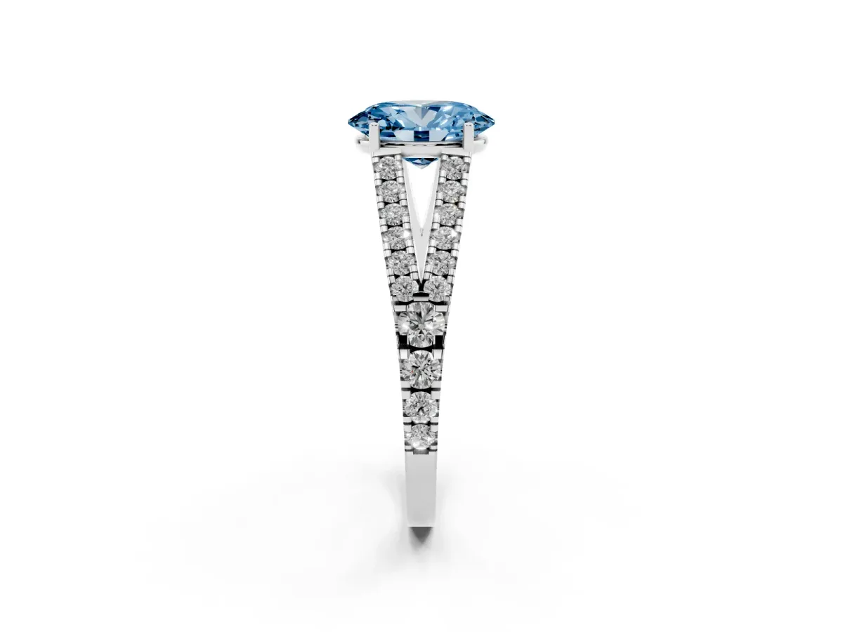 Fancy Blue Oval Cut Diamond Split Shank Engagement Ring with Round Pavé and Prong Setting Silver