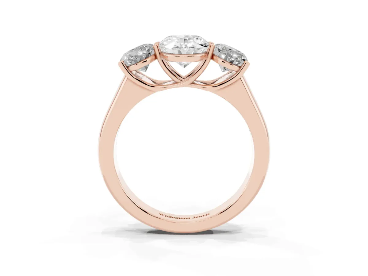 Oval Cut Three-Stone Diamond Ring with Prong Setting on a Classic Band Rose gold