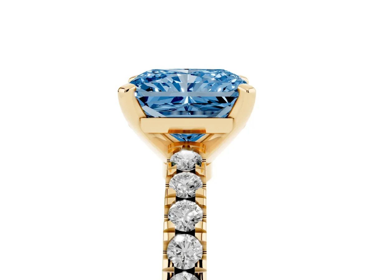 Fancy Blue Radiant Cut Solitaire Diamond with Pavé Band and Four-Prong Setting Yellow gold