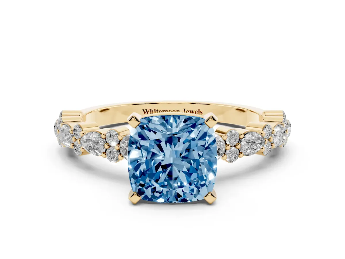 Fancy Blue Cushion Cut Diamond Side Stone Solitaire Ring with Round and Four-Prong Setting Yellow gold