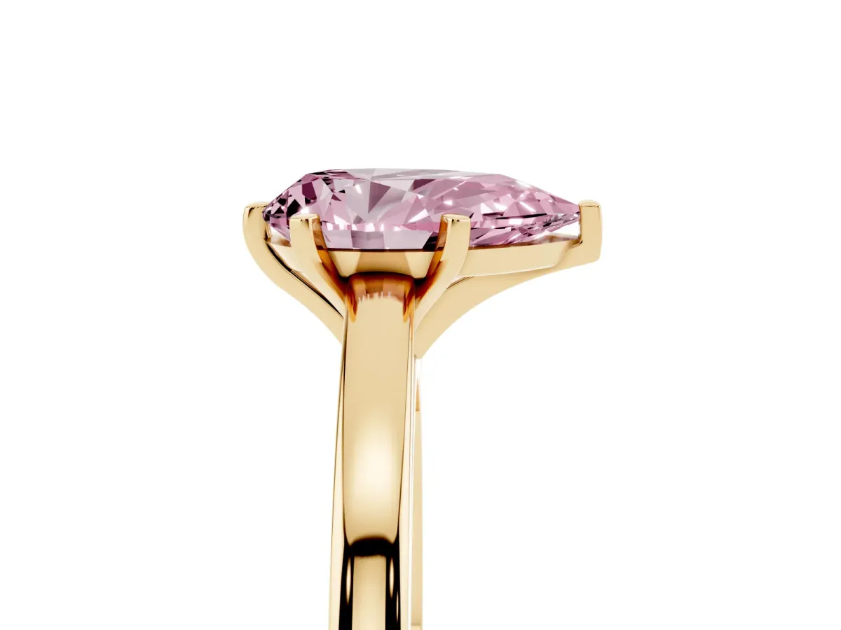 Fancy Pink Pear Cut Solitaire Diamond Engagement Ring with Four-Prong Setting on a Classic Band Yellow gold
