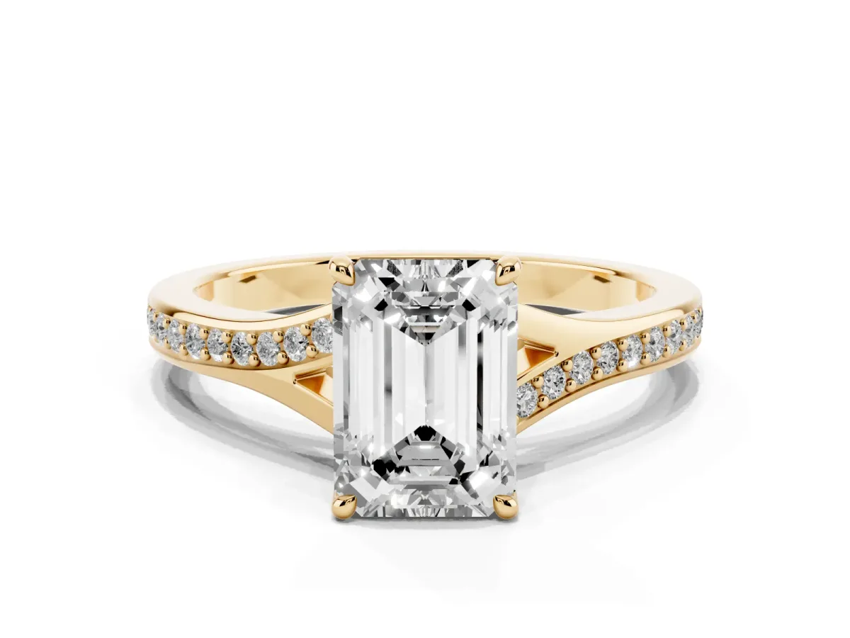 Emerald Cut Diamond Solitaire Ring with Pavé Band and Prong Setting Yellow gold