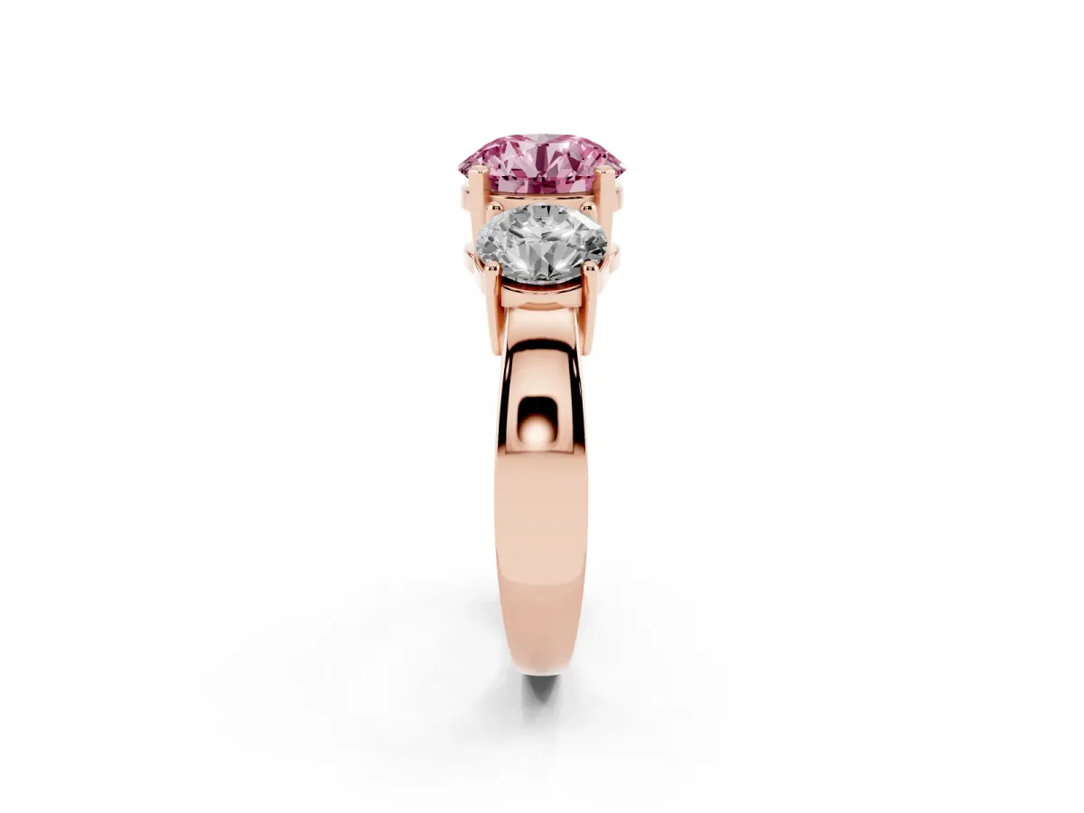 Fancy Pink Three-Stone Round Cut Diamond Ring with Round Side Stones, Classic Band, and Four-Prong Setting Rose gold