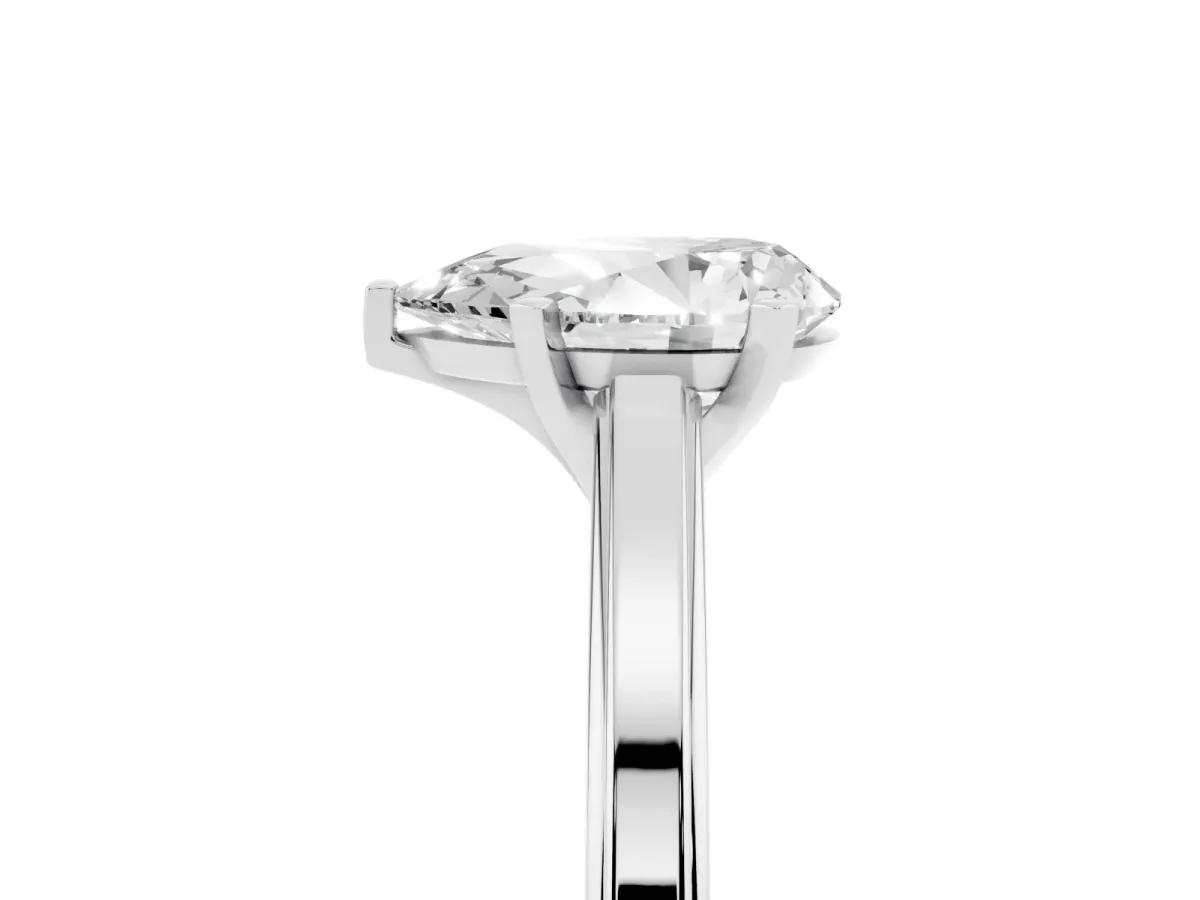 Pear Cut Solitaire Diamond Ring with Four-Prong Setting and Classic Band Platinum