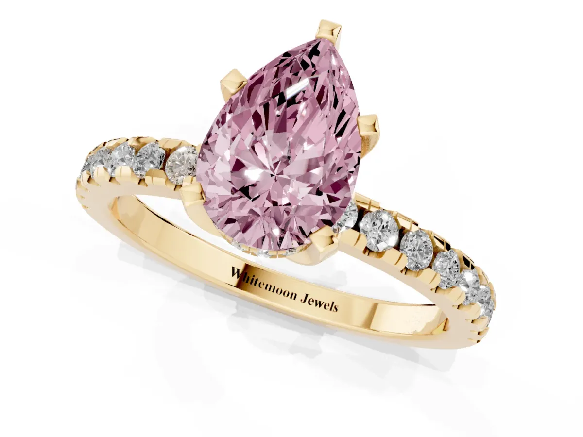 Fancy Pink Pear Cut Diamond Solitaire Ring with Round Pavé Band and Four-Prong Setting Yellow gold
