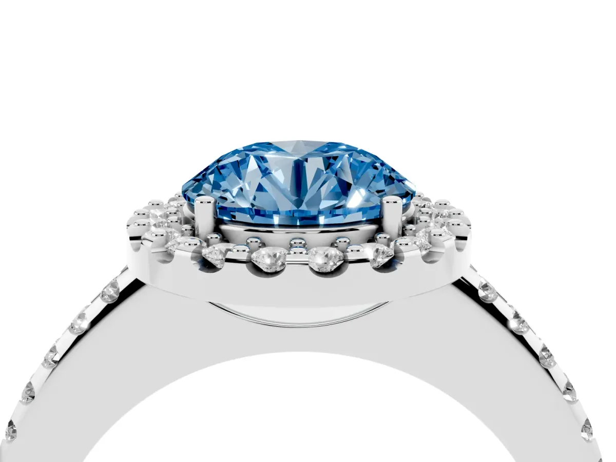 Fancy Blue Round Cut Diamond Pavé Halo Ring with Four-Prong Setting Platinum