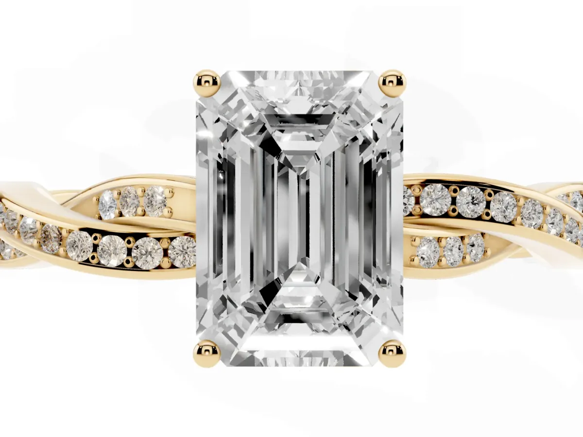 Emerald Cut Solitaire Twisted Pave Diamond Ring with Four-Prong Setting Yellow gold