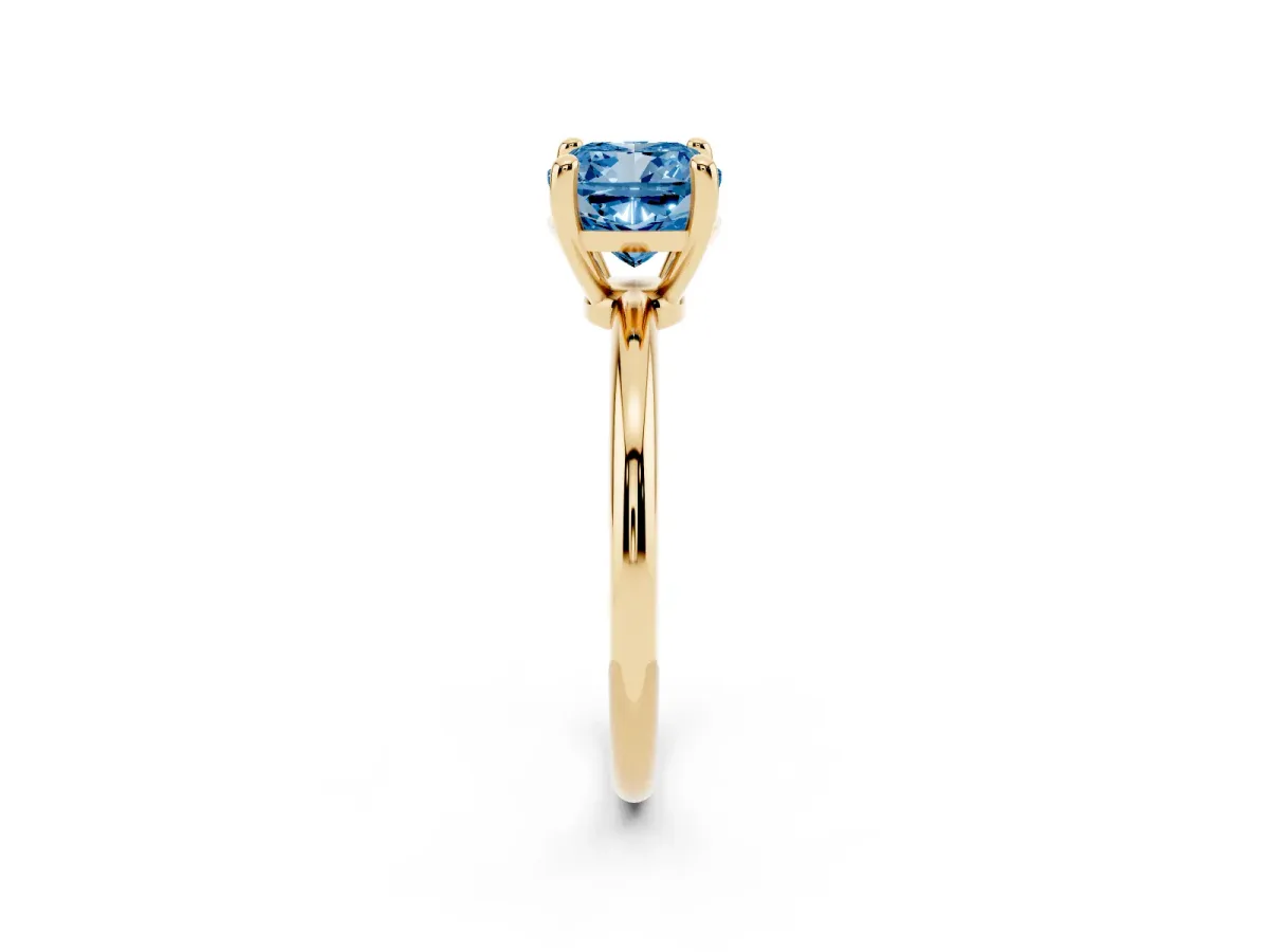 Fancy Blue Cushion Cut Solitaire Diamond Ring with 4-Prong Setting on a Classic Band Yellow gold