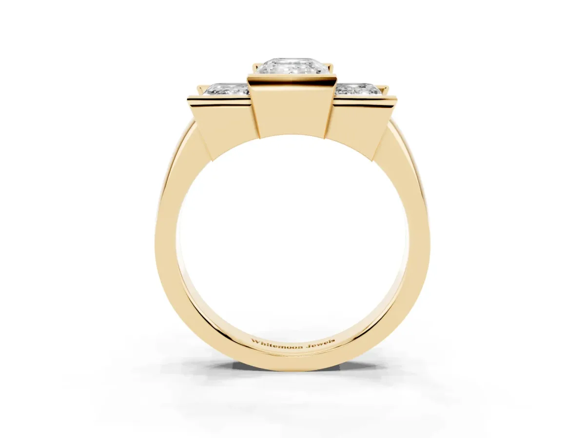 Three Stone Emerald Cut Cut Channel Set Diamond Ring Yellow gold