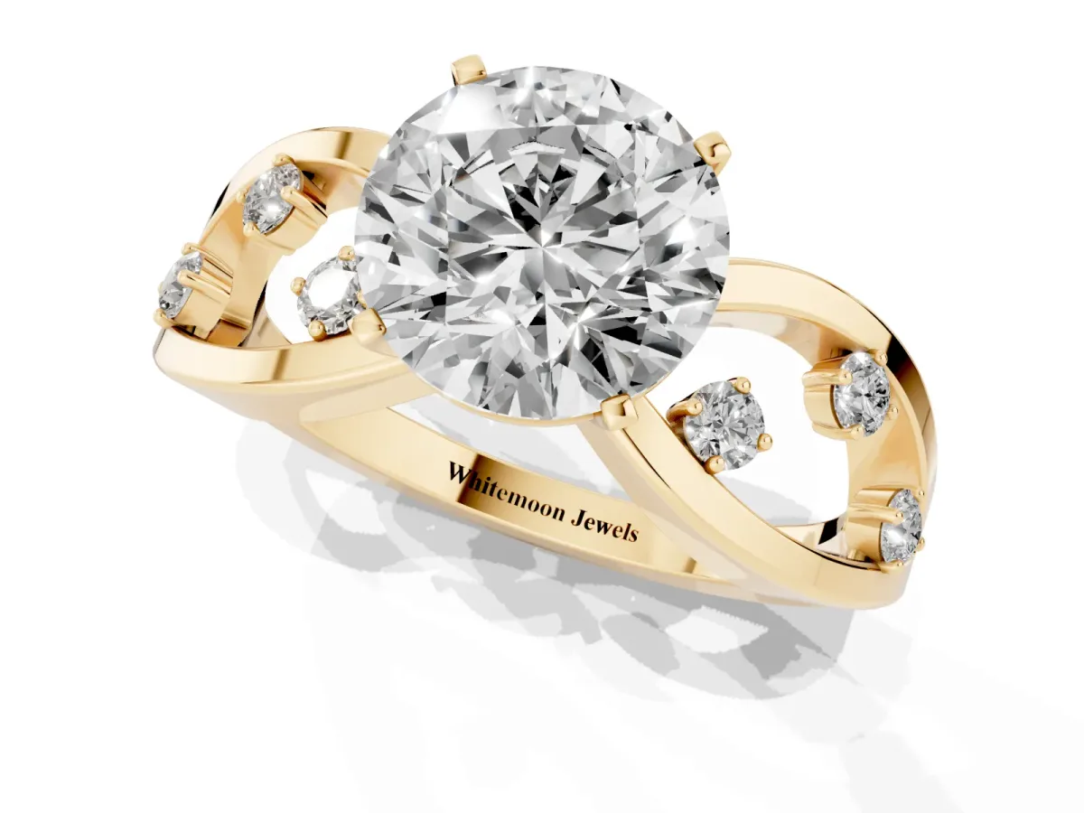 Round Cut Cut Solitaire Diamond with Side Stones on Criss-Cross Band and Four-Prong Setting Yellow gold