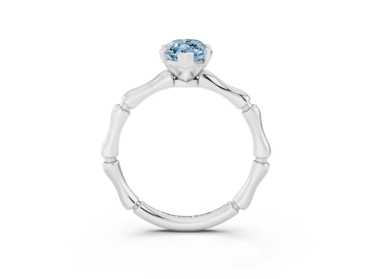 Fancy Blue Marquise Cut Solitaire Diamond Ring with Bamboo Band and Four-Prong Setting Silver