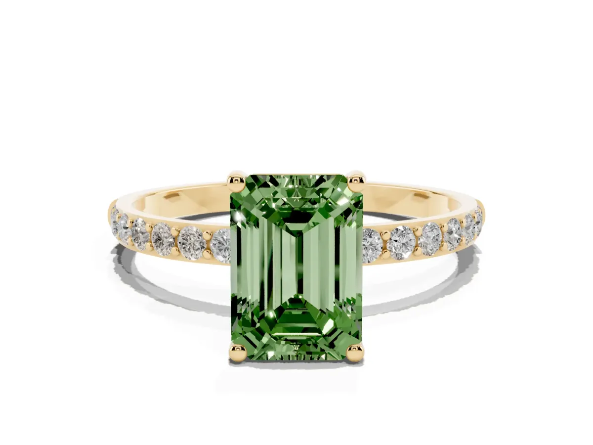 Fancy Green Emerald Cut Diamond Solitaire Ring with Round Pavé Shoulders and Prong Setting Yellow gold