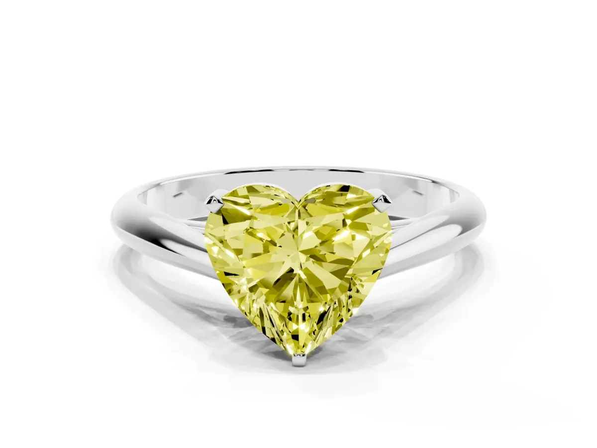 Fancy Yellow Heart Cut Diamond Solitaire Engagement Ring with Cathedral Setting and Four-Prong Mount Silver