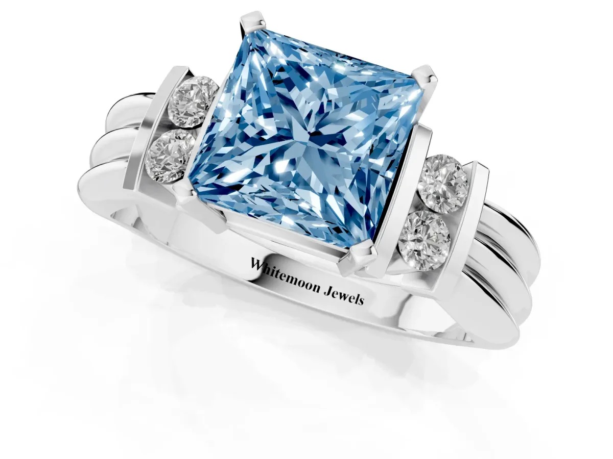Fancy Blue Princess Cut Cut Three-Stone Channel Set Ring with Bar Prongs Silver