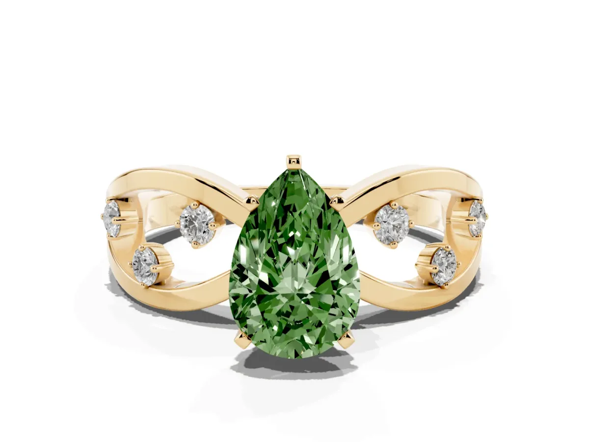 Fancy Green Pear Cut Cut Solitaire Diamond with Side Stones on Criss-Cross Band and Four-Prong Setting Yellow gold