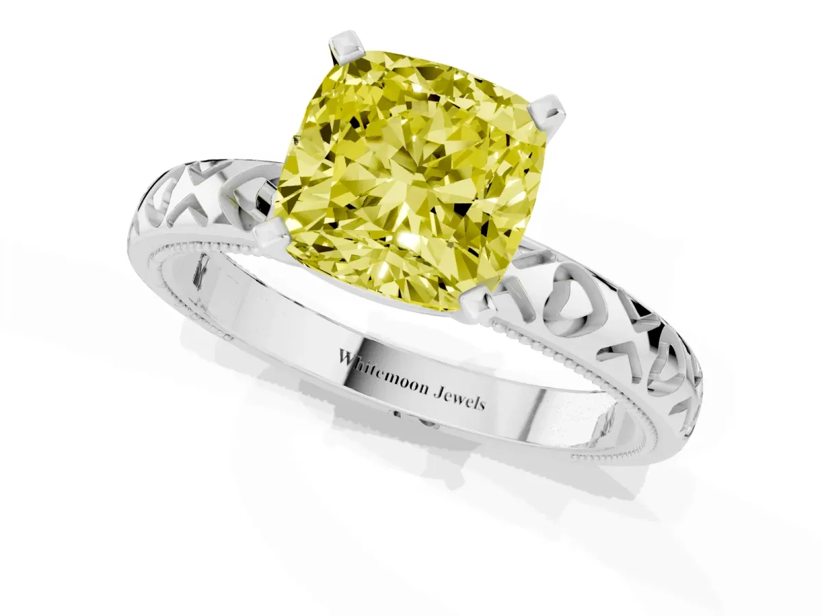 Fancy Yellow Cushion Cut Solitaire Diamond Engagement Ring with XO Engraved Band and Four-Prong Setting Platinum