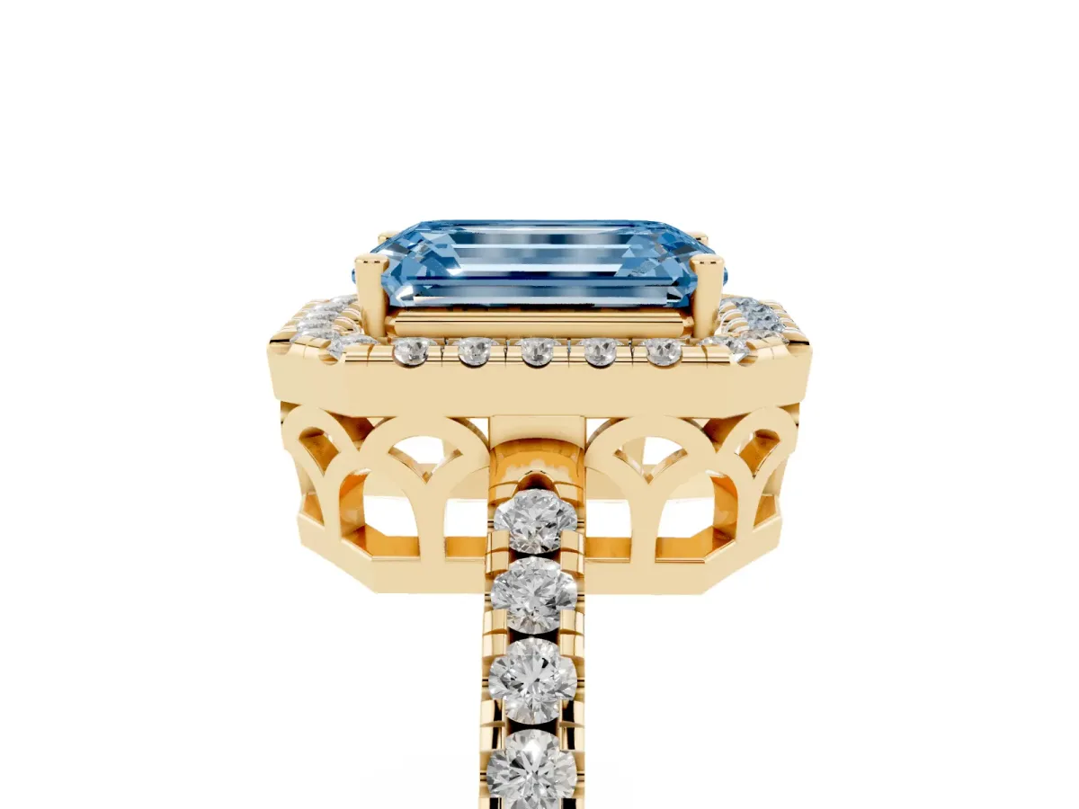 Fancy Blue Emerald Cut Halo Diamond Engagement Ring with Pavé Band and Four-Prong Setting Yellow gold