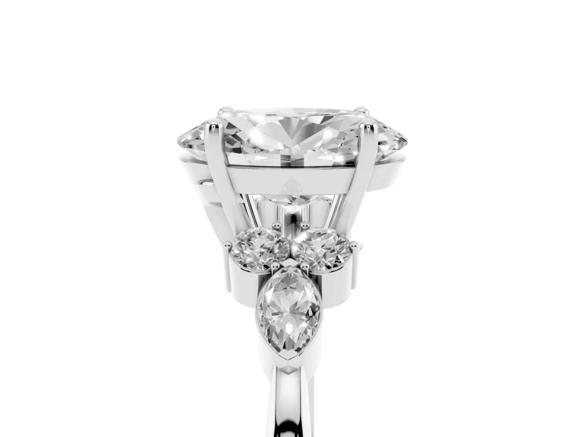 Oval Cut Brilliant Diamond Solitaire Ring with Pear Side Stones and Four-Prong Setting Silver