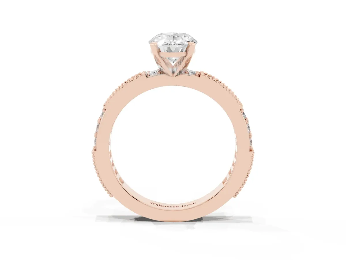 Oval Cut Solitaire with Pavé Band and Four-Prong Setting Rose gold
