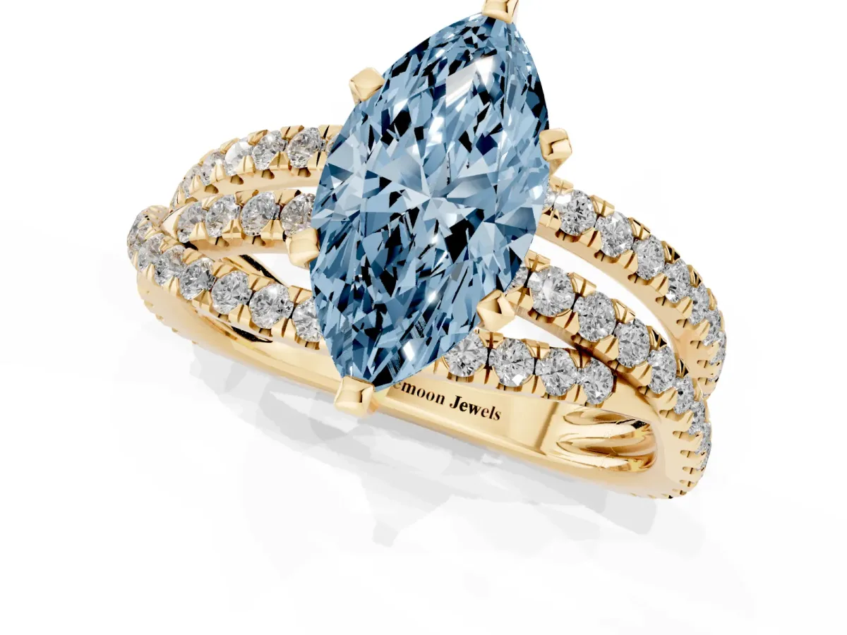 Fancy Blue Marquise Cut Solitaire Twist Band with Pavé Setting and Four-Prong Setting Yellow gold