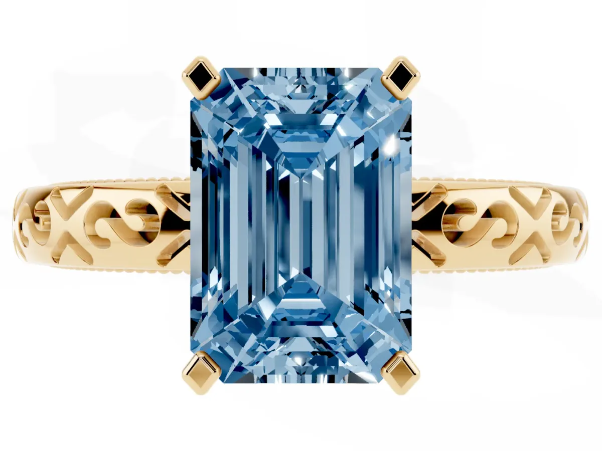 Fancy Blue Emerald Cut Solitaire Engagement Ring with Scrollwork Band and Four-Prong Setting Yellow gold