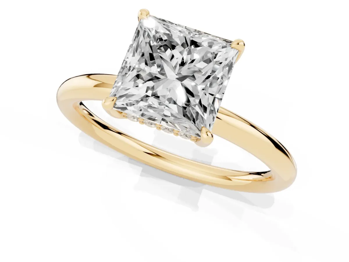 Princess Cut Diamond Solitaire Ring with Thin Band and Four-Prong Setting Yellow gold