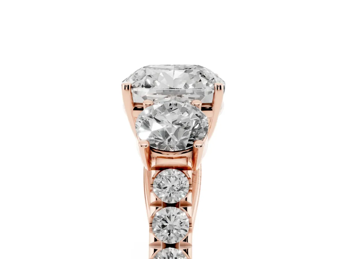 Cushion Cut Cut Diamond Three-Stone Ring with Round Side Stones and Pavé Band Rose gold