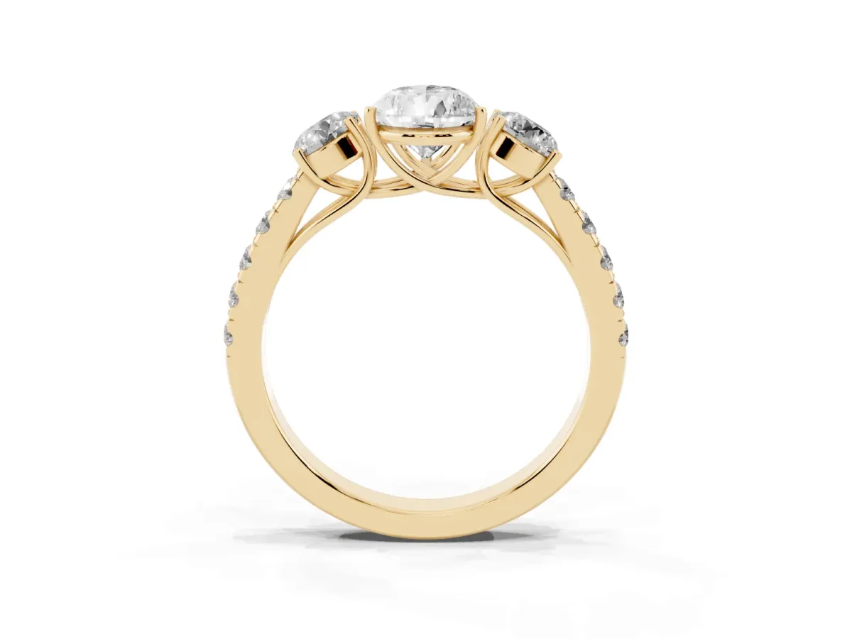 Pear Cut Cut Diamond Three-Stone Ring with Round Side Stones and Pavé Band Yellow gold