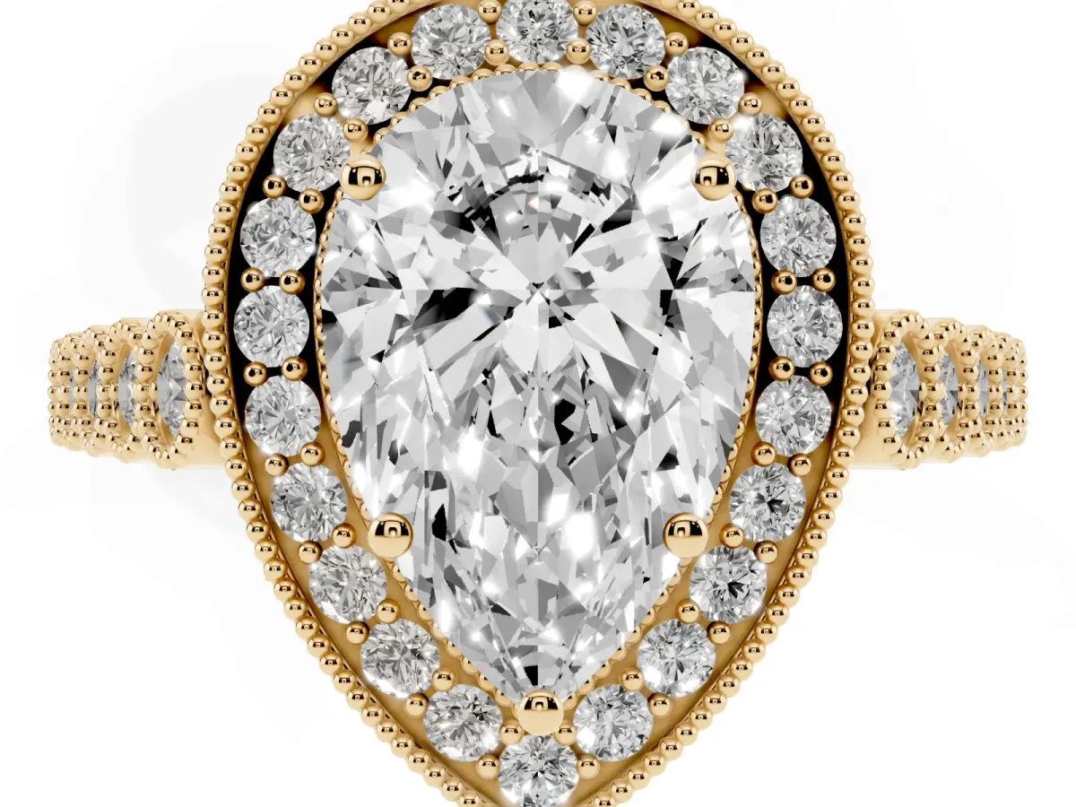 Pear Cut Halo Milgrain Solitaire with Bezel Set Side Stones and Pave Band Yellow gold