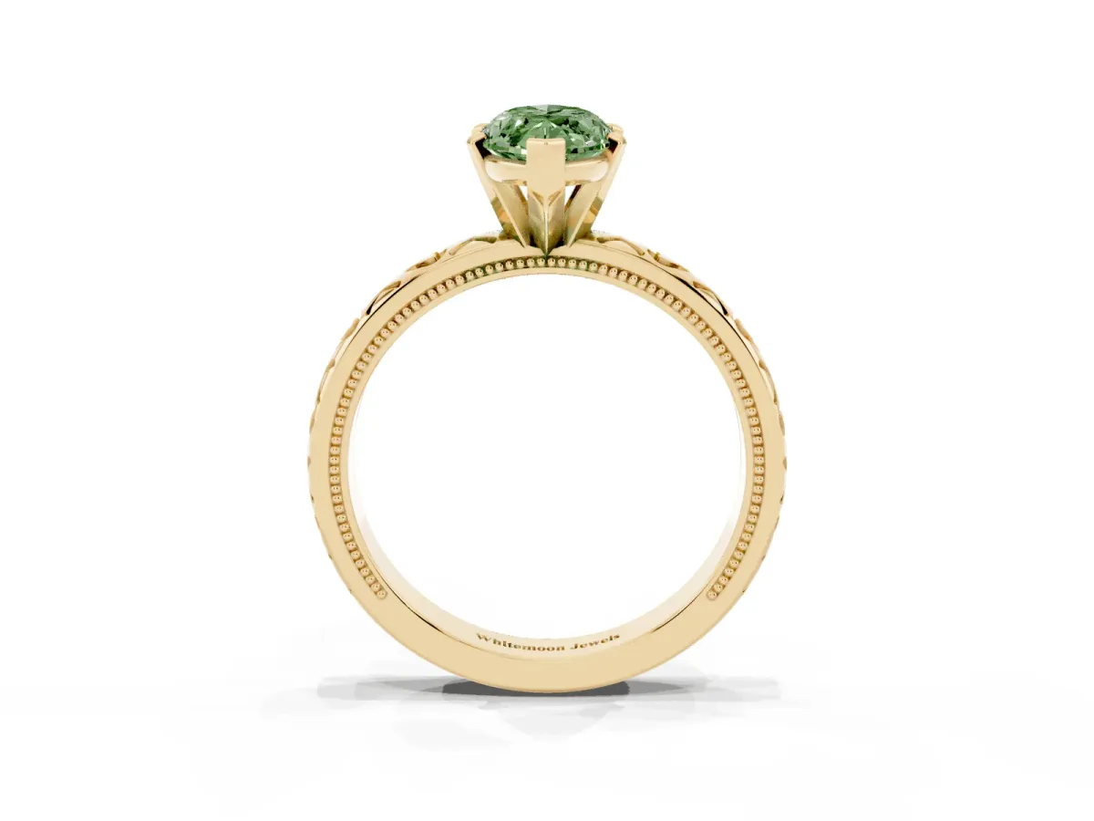 Fancy Green Marquise Cut Solitaire Diamond Engagement Ring with XO Engraved Band and Four-Prong Setting Yellow gold