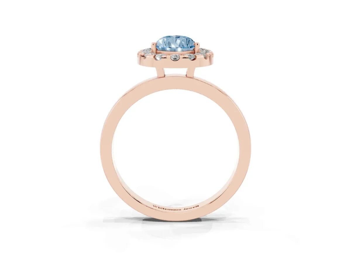 Fancy Blue Pear Cut Halo Diamond Solitaire with Pavé Band and Four-Prong Setting Rose gold