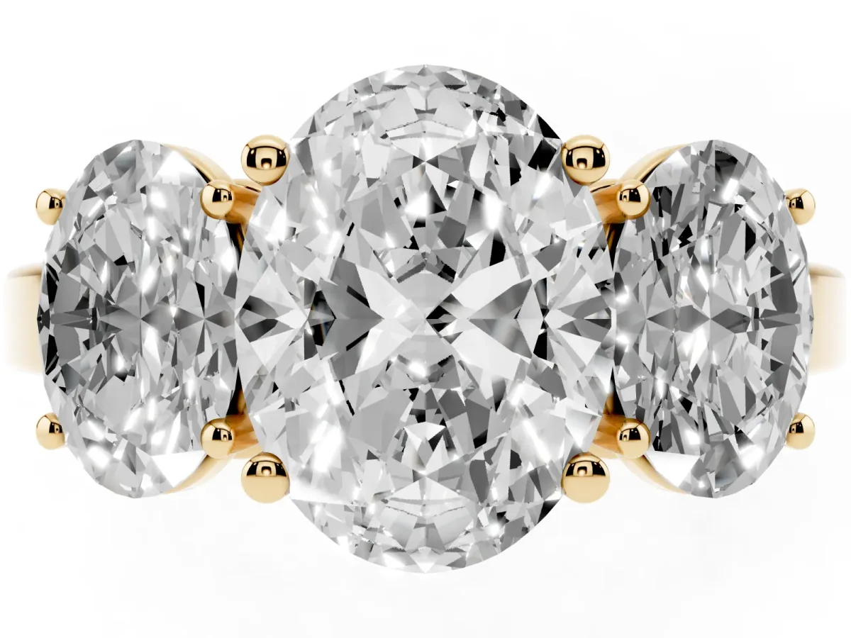 Three-Stone Oval Cut Cut Diamond Engagement Ring with Flat Band and Four-Prong Setting Yellow gold