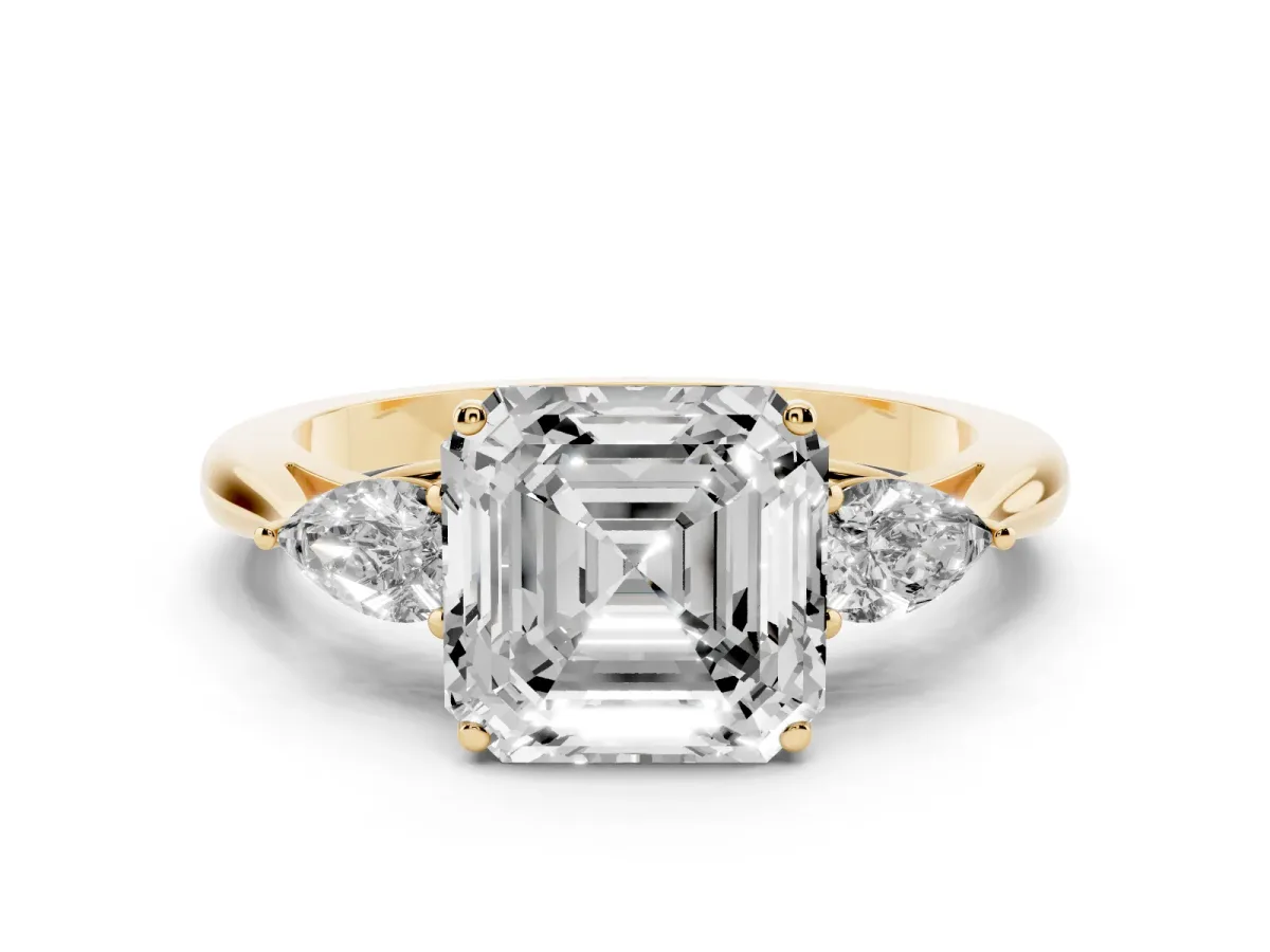 Asscher Cut Diamond Three-Stone Ring with Pear Side Stones and Prong Setting Yellow gold