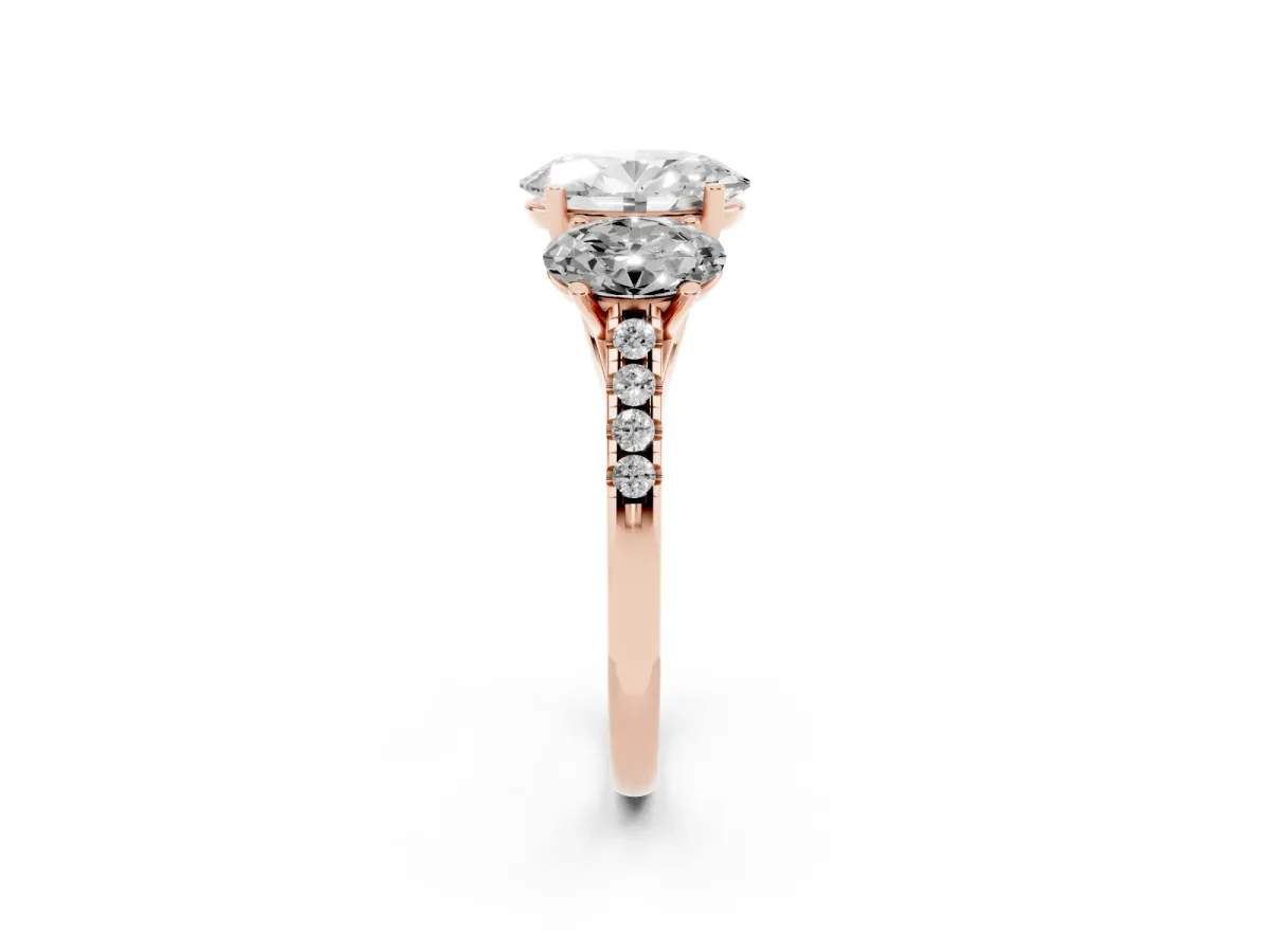 Three-Stone Oval Cut Diamond Ring with Round Pavé Band and Prong Setting Rose gold