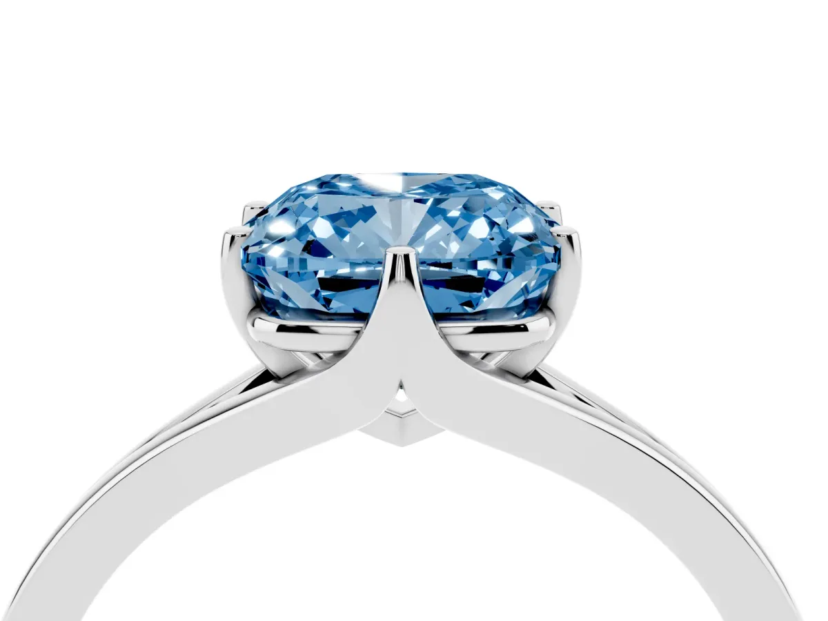 Fancy Blue Cushion Cut Solitaire Diamond Ring with Six-Prong Setting and Tapered Band Platinum