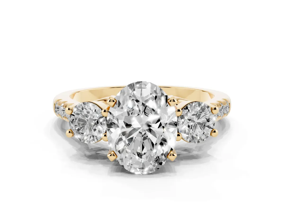 Three-Stone Oval Cut Diamond Pavé Band with Four-Prong Setting Yellow gold