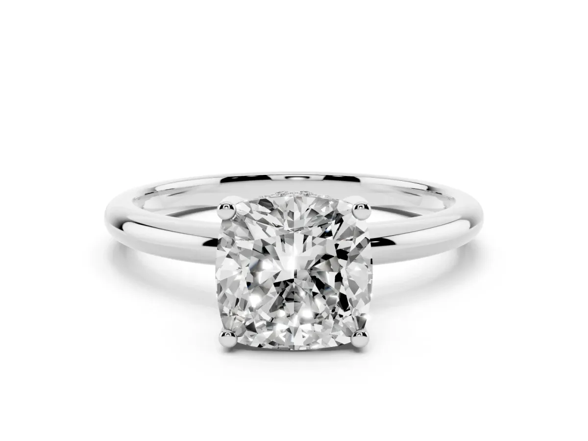 Cushion Cut Cut Solitaire Engagement Ring with Four-Prong Setting and Classic Band Silver