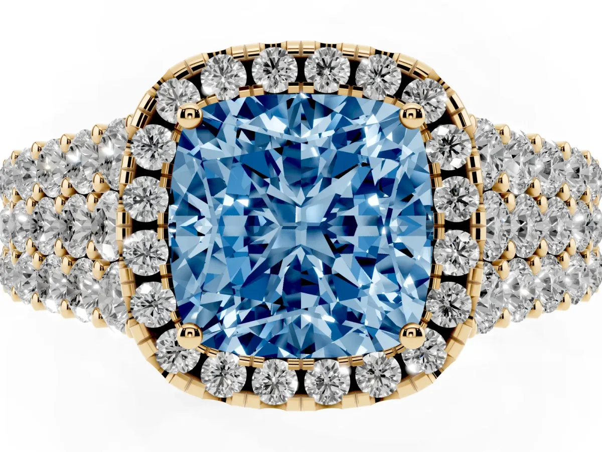 Fancy Blue Cushion Cut Diamond Halo Engagement Ring with Triple Row Round Pavé Band and Prong Setting Yellow gold
