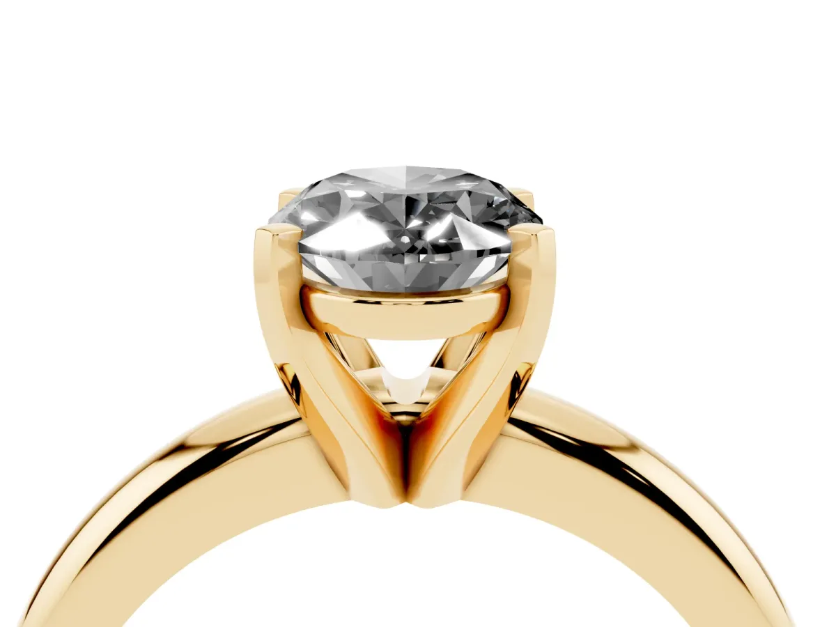 Fancy Black Oval Cut Diamond Solitaire Engagement Ring with Round Band and Four-Prong Setting Yellow gold