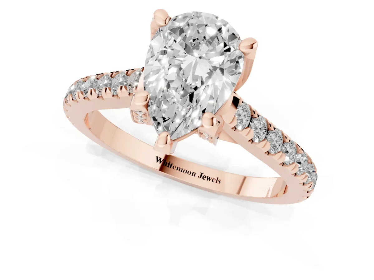 Pear Cut Brilliant Diamond Solitaire with Pavé Band and Four-Prong Setting Rose gold