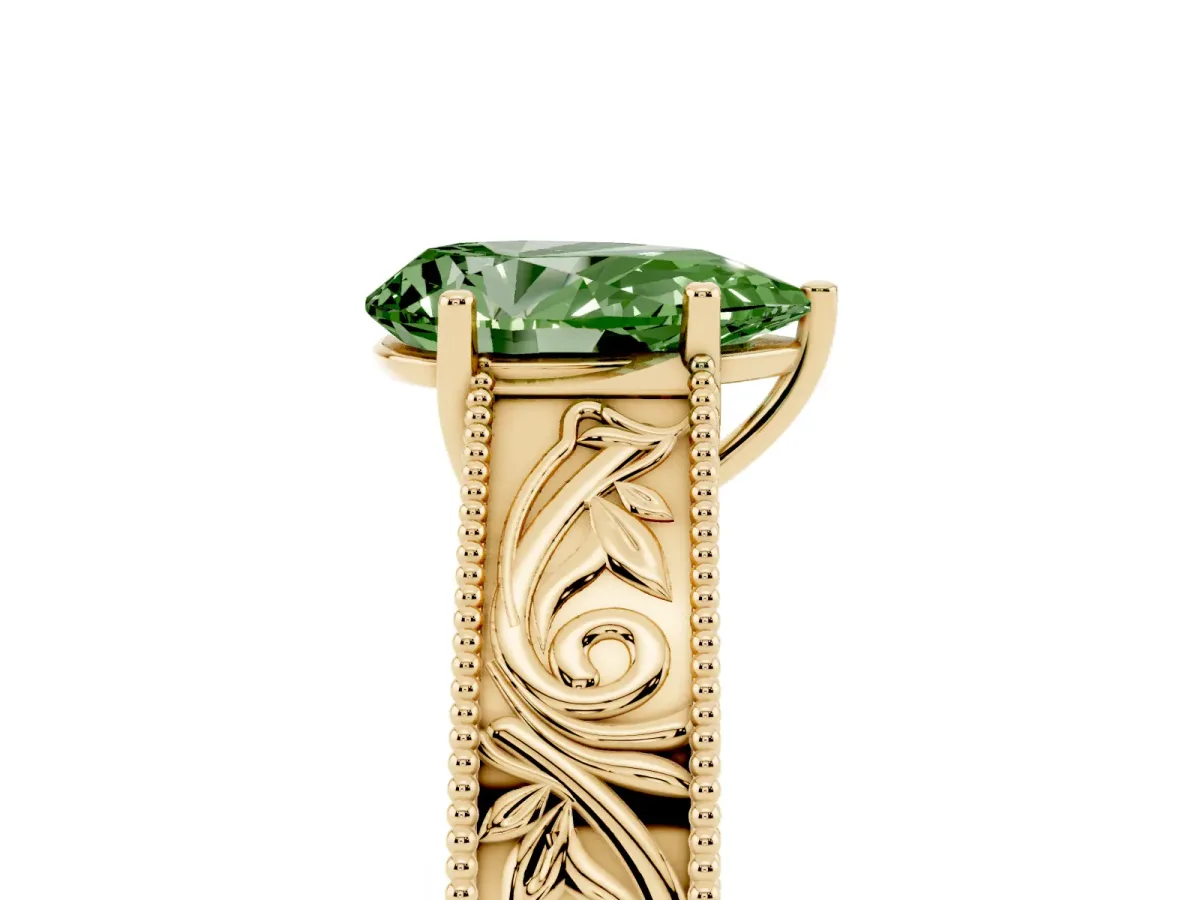Fancy Green Pear Cut Diamond Solitaire Ring with Engraved Band and Four-Prong Setting Yellow gold