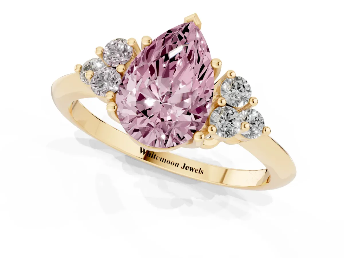 Fancy Pink Pear Cut Cut Diamond Cluster Ring with Solitaire Band and Four-Prong Setting Yellow gold