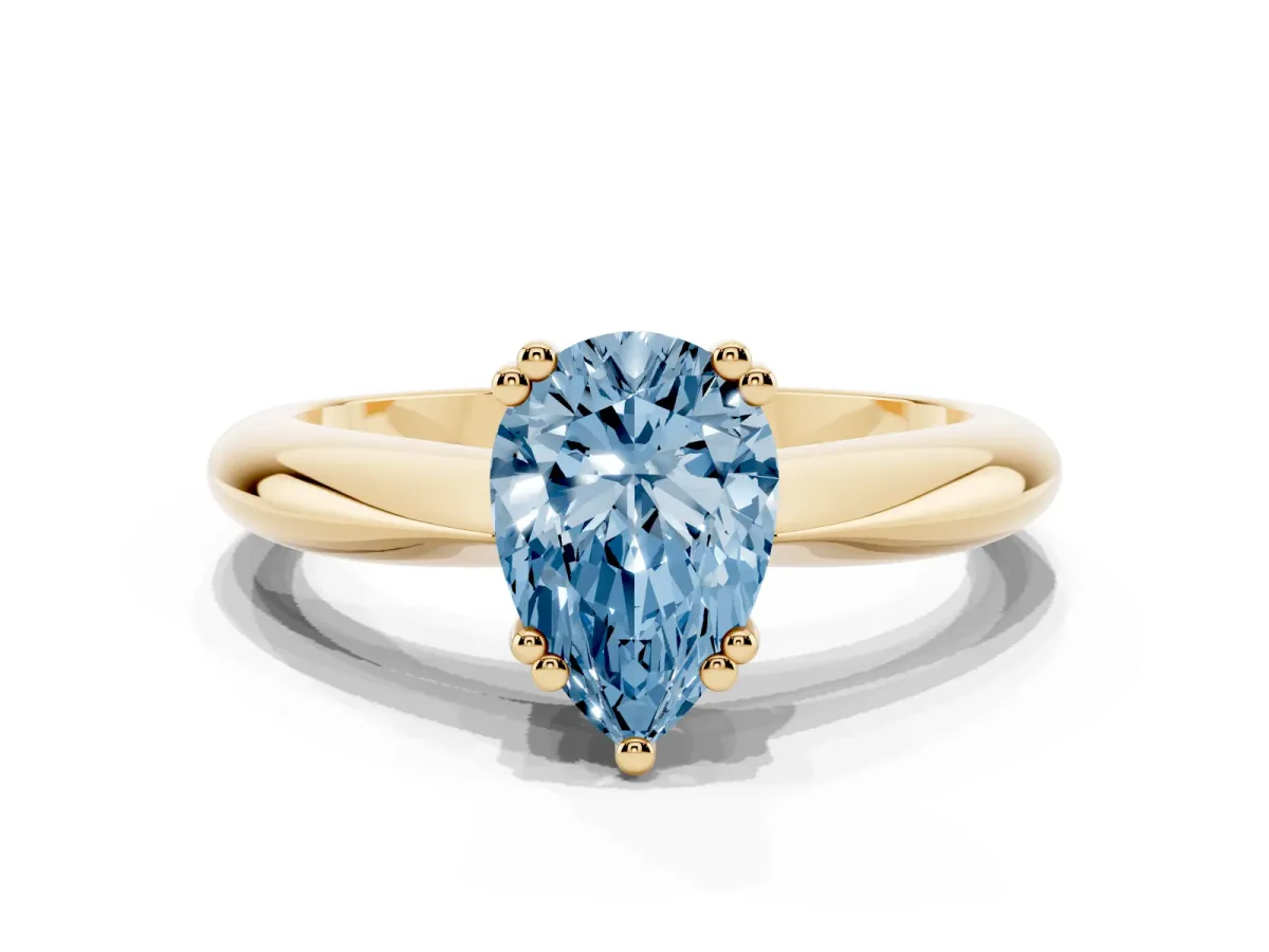 Fancy Blue Pear Cut Cut Solitaire Engagement Ring with Tapered Band and Four-Prong Setting Yellow gold