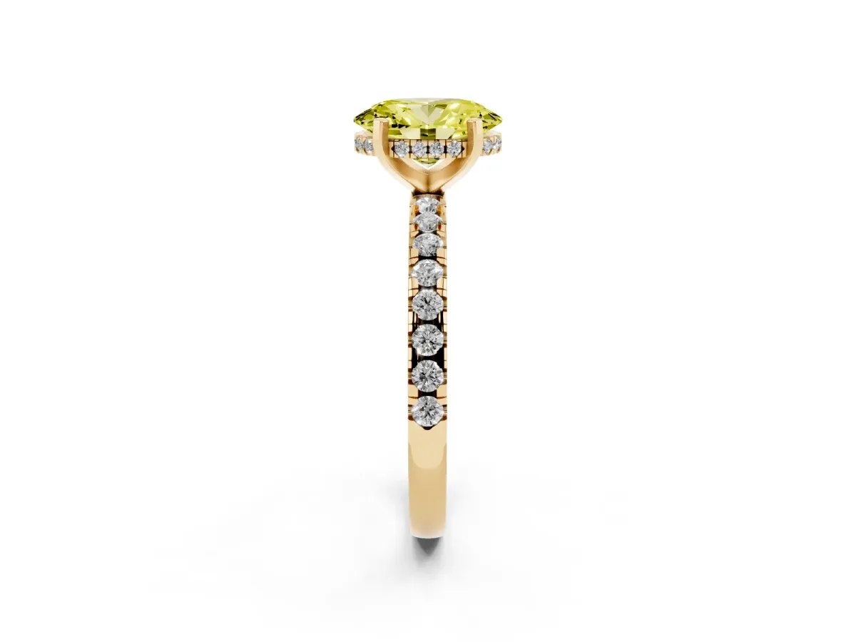 Fancy Yellow Oval Cut Diamond Solitaire Ring with Round Pavé Band and Four-Prong Setting Yellow gold