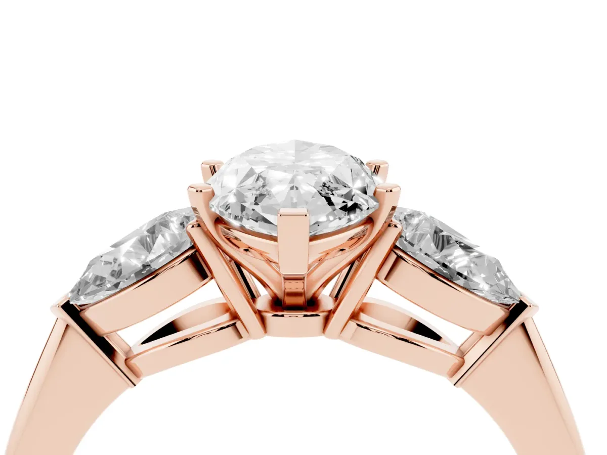 Three-Stone Marquise Cut Diamond Ring with Pear Side Stones and Four-Prong Setting Rose gold